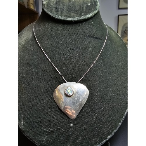 244 - Large 925 silver pendant inset with colourful abalone shell, set on a very long 24