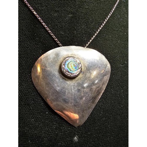 244 - Large 925 silver pendant inset with colourful abalone shell, set on a very long 24