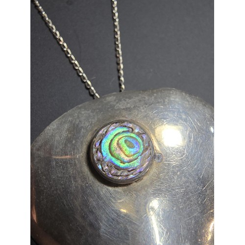 244 - Large 925 silver pendant inset with colourful abalone shell, set on a very long 24