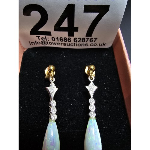 247 - Pair of stunning 925 silver drop earrings set with clear cz stones and faux opal drops which feature... 