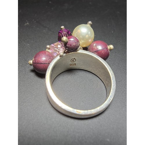 248 - ornate 925 silver ring featuring a cluster of faux pearls and purple glass beads, in good clean cond... 