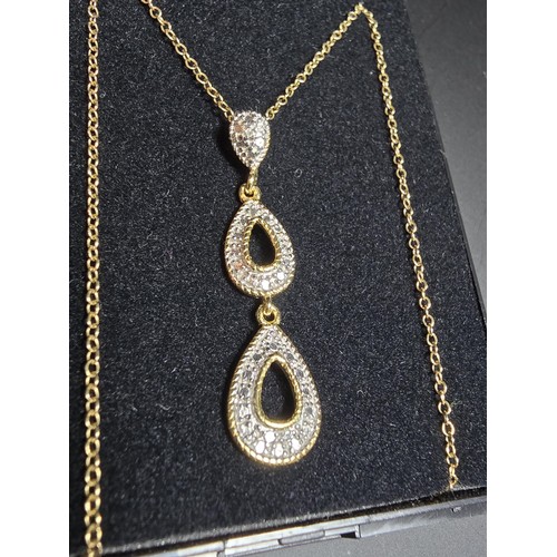 260 - Pretty gilt 925 silver drop pendant set on a 18