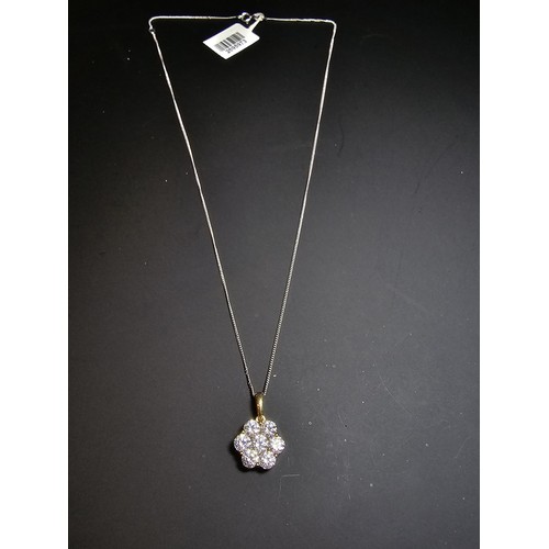 261 - Stunning gilt 925 silver flower formed pendant inset with very sparkly CZ crystal stones which catch... 