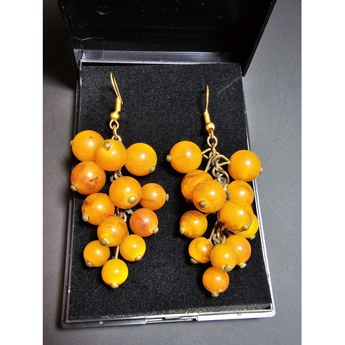 265 - Pair of vintage stunning genuine amber beaded drop earrings in the form of a bunch of grapes, each a... 