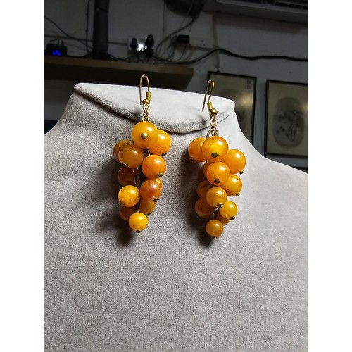 265 - Pair of vintage stunning genuine amber beaded drop earrings in the form of a bunch of grapes, each a... 