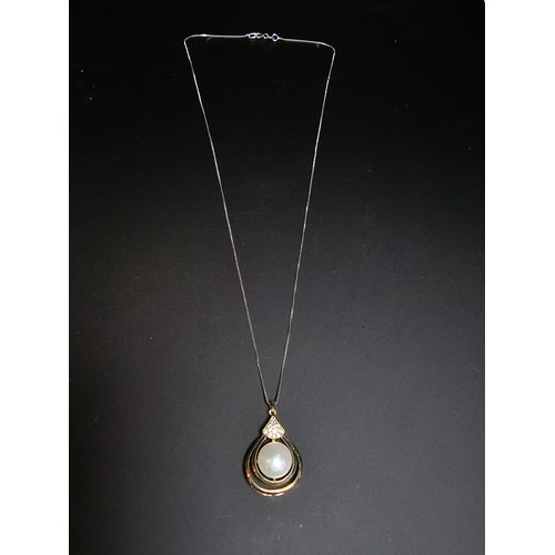 267 - Good gilt on 925 silver pendant inset with a large genuine pearl & CZ stones set on a 18