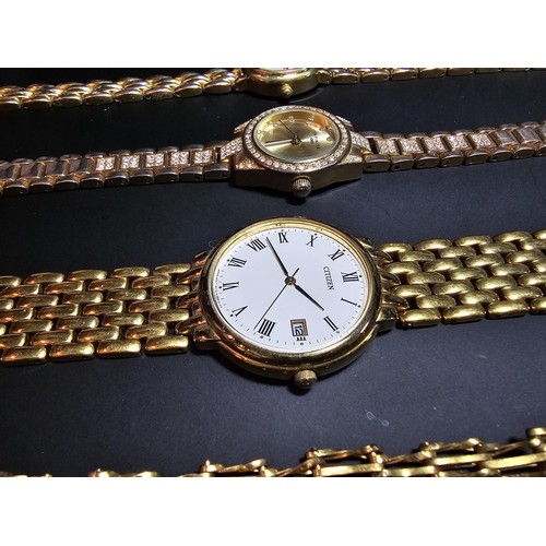 278 - 3x gold tone wrist watches inc a citizen along with an ornate gold plated bracelet and a gold plated... 