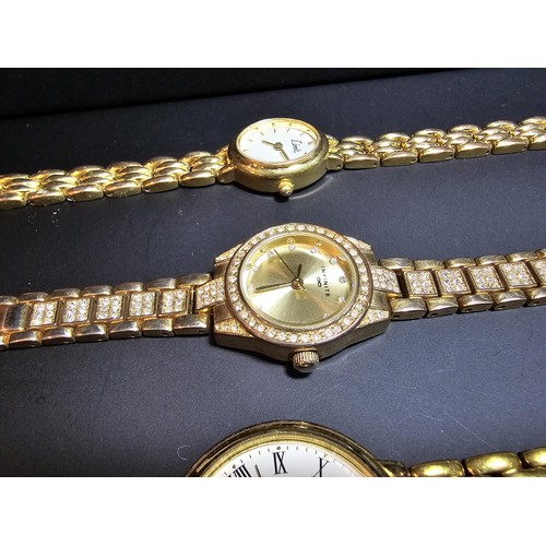 278 - 3x gold tone wrist watches inc a citizen along with an ornate gold plated bracelet and a gold plated... 