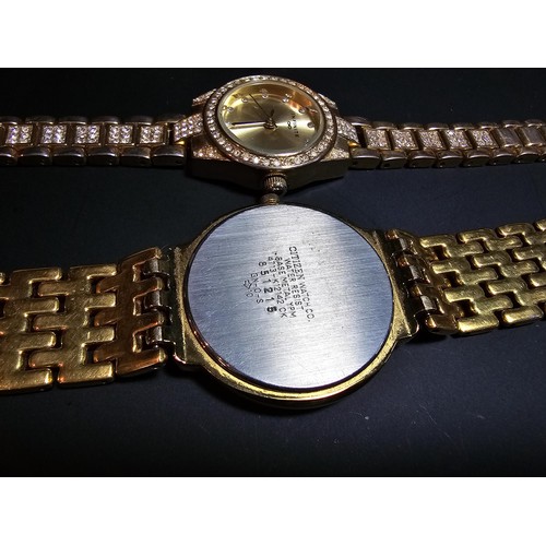 278 - 3x gold tone wrist watches inc a citizen along with an ornate gold plated bracelet and a gold plated... 