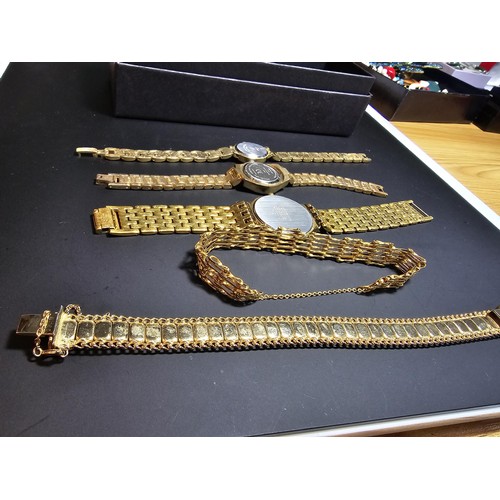 278 - 3x gold tone wrist watches inc a citizen along with an ornate gold plated bracelet and a gold plated... 