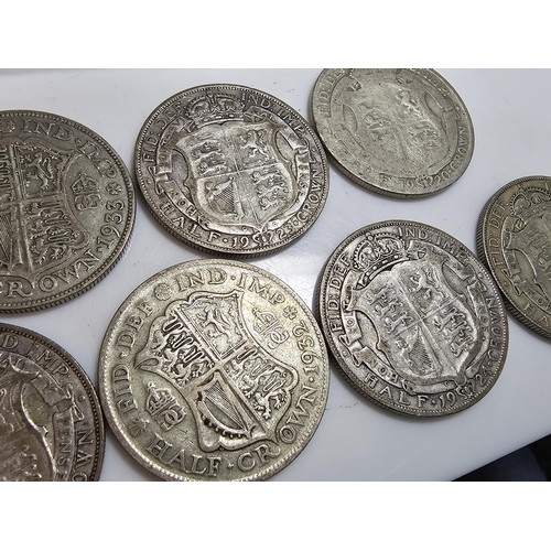 293 - Qty of 7x Silver British half crown coins, they all Pre date 1947. have a total weight of 97.1g.