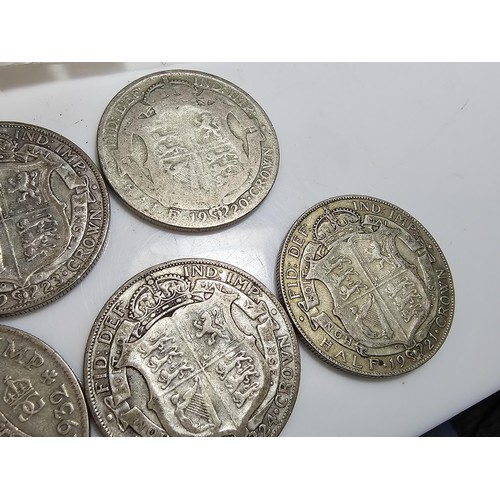 293 - Qty of 7x Silver British half crown coins, they all Pre date 1947. have a total weight of 97.1g.