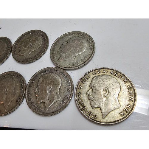 293 - Qty of 7x Silver British half crown coins, they all Pre date 1947. have a total weight of 97.1g.