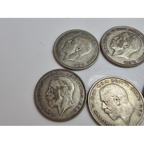 293 - Qty of 7x Silver British half crown coins, they all Pre date 1947. have a total weight of 97.1g.