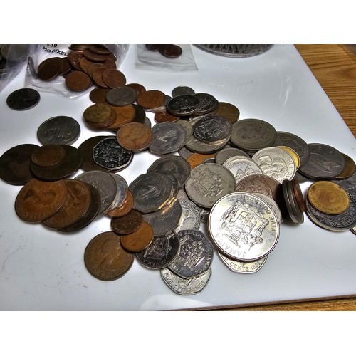 297 - Coronation Glass Pitcher containing a large qty of various world coins, please study photos for more... 