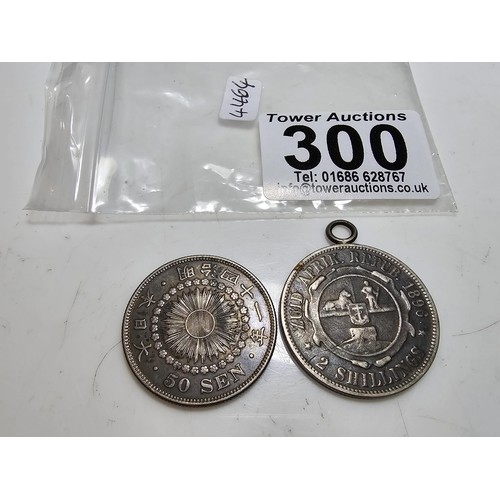 300 - 2x good antique silver coins to inc. an antique japanese 50 Sen silver coin and an antique 1896 S.Af... 