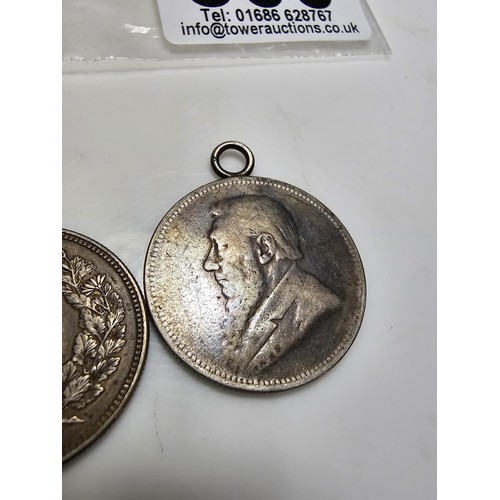 300 - 2x good antique silver coins to inc. an antique japanese 50 Sen silver coin and an antique 1896 S.Af... 