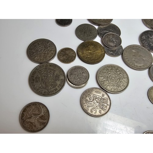 303 - qty of various coins from around the world to inc. 9x American coins some which have some silver con... 