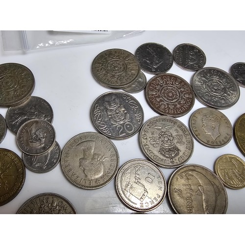 303 - qty of various coins from around the world to inc. 9x American coins some which have some silver con... 