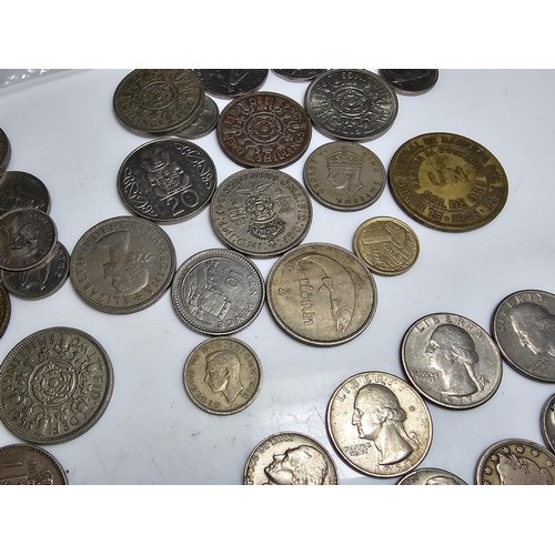 303 - qty of various coins from around the world to inc. 9x American coins some which have some silver con... 