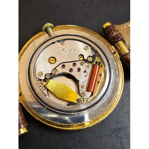 308 - A good quality genuine Gents Cartier watch, 925 silver gold plated with the flower and duck emblem t... 