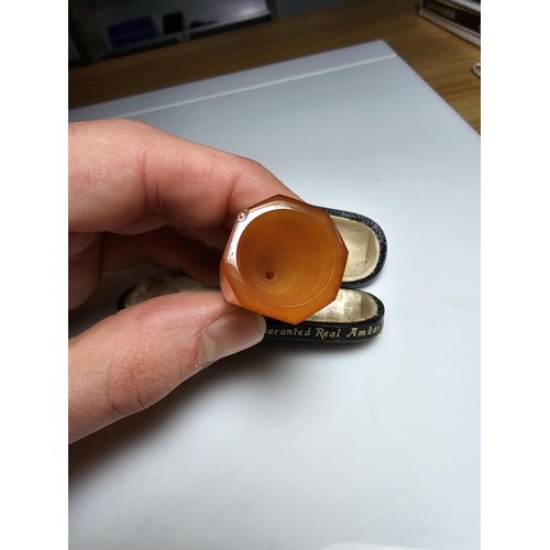 305 - A good quality Solid butter scotch amber cigar cheroot holder fitted in its original case in excelle... 