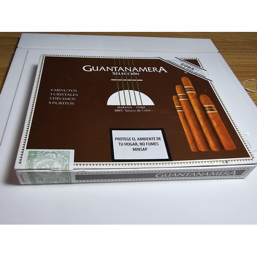 310 - Case containing a large quantity of sealed cigars and cigarillos to include  2x different brands (Gu... 