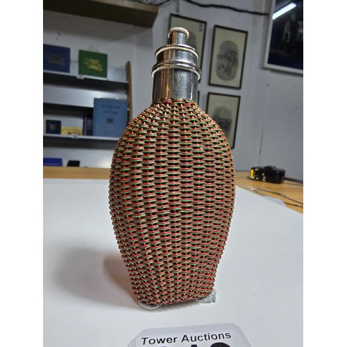 312 - Good quality antique Perfume / scent bottle wrapped in rattan weave featuring a dispensing lid marke... 