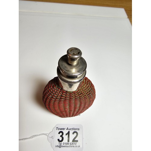 312 - Good quality antique Perfume / scent bottle wrapped in rattan weave featuring a dispensing lid marke... 