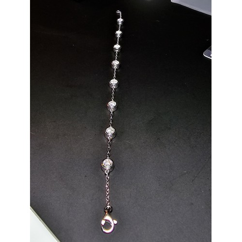 315 - Stunning brand new 925 Silver bracelet inset with 8x Moissanite Diamond Gem Stones, each stone is 0.... 