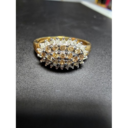 316 - Stunning 9ct Yellow Gold Diamond Cluster Ring inset with a large quantity of chocolate diamonds to t... 