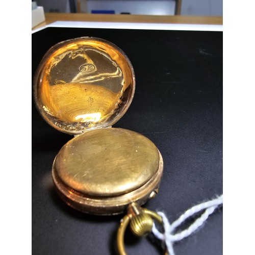 317 - 9ct Yellow Gold Fob Watch having an ornate engraved case marked 9K inside. Watch has a total weight ... 