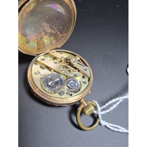 317 - 9ct Yellow Gold Fob Watch having an ornate engraved case marked 9K inside. Watch has a total weight ... 