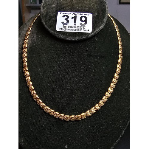 319 - Hallmarked 18ct Yellow Gold Neck chain with an unusual link design, Total weight of 25.5 grams in ex... 