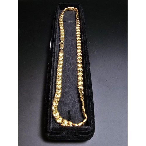 319 - Hallmarked 18ct Yellow Gold Neck chain with an unusual link design, Total weight of 25.5 grams in ex... 