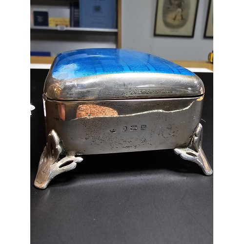 325 - Fine quality hallmarked silver footed lidded box featuring a blue Guilloche enamel top hallmarked to... 