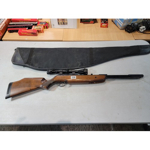 330 - A good BSA superstar .22 cal under Lever air rifle with a bushmaster 6x40 scope, in very good condit... 