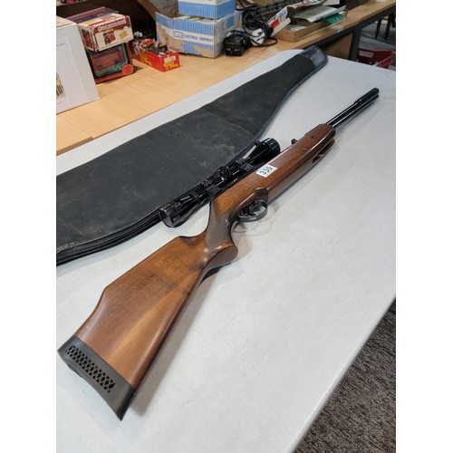 330 - A good BSA superstar .22 cal under Lever air rifle with a bushmaster 6x40 scope, in very good condit... 