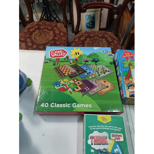 96 - Quantity of children's toys inc a Chad valley 40 classic game set, Dunelm Dino hunt set, Boxed Hape ... 