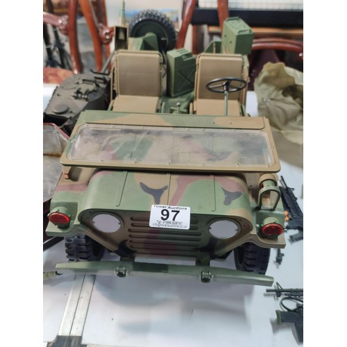 97 - Crate containing a large quantity of military related toy figures inc soldiers, variety of guns, tan... 