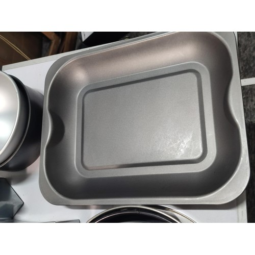 98 - Box containing a large quantity of good quality non stick cake tins inc a t-shirt shaped tin, pyrex ... 