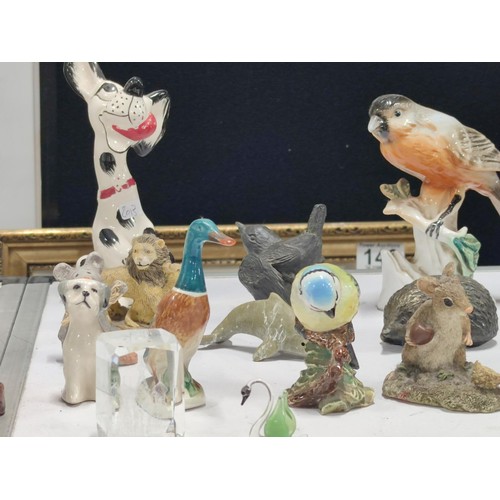 109 - Box containing a large quantity of collectables inc bird figurines, inc a Beswick blue tit, Walt Dis... 