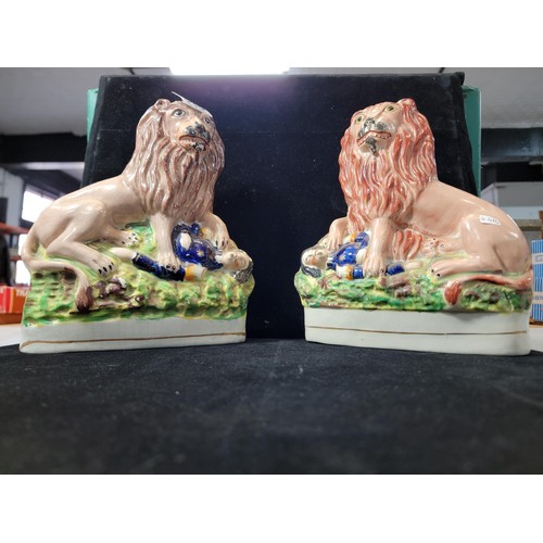 348 - A pair of rare antique Staffordshire earthenware 'The British Defeating The French' figures, circa 1... 