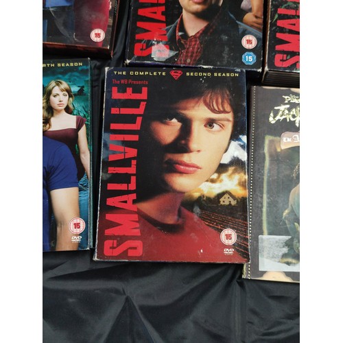 116 - Quantity of DVD's inc Smallville box sets, batman, Dragon, Spiderman etc