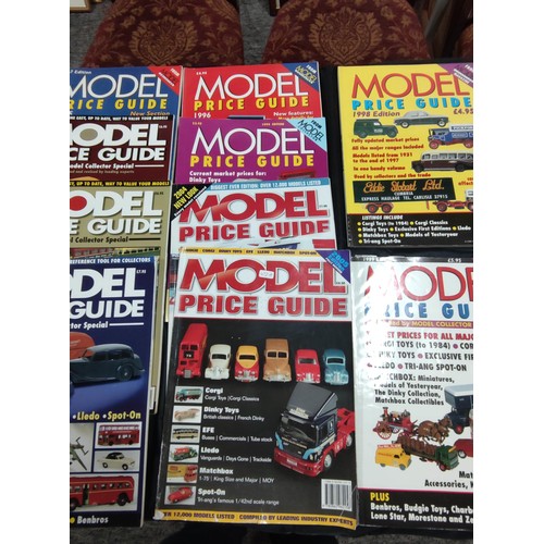 120 - Quantity of Model price guide magazines from the 90's - 2000's along with Olympic world records book... 