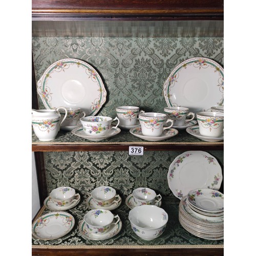 376 - A part tea set of Clifton china in Nancy design along with Heathcote china tea cups and saucers.