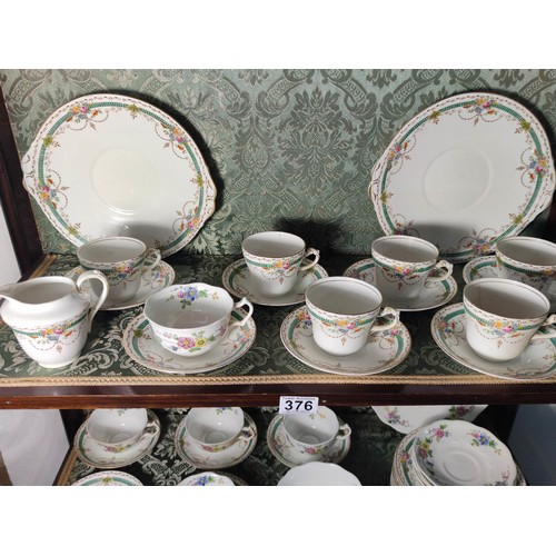 376 - A part tea set of Clifton china in Nancy design along with Heathcote china tea cups and saucers.