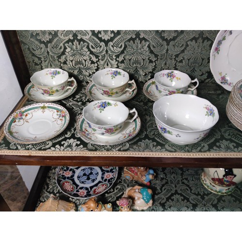 376 - A part tea set of Clifton china in Nancy design along with Heathcote china tea cups and saucers.