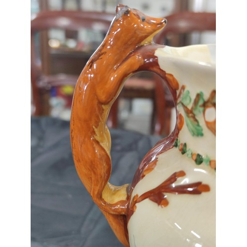 378 - A large hand painted John Peel musical jug with John Peel poem to the front, contains fox handle (mi... 