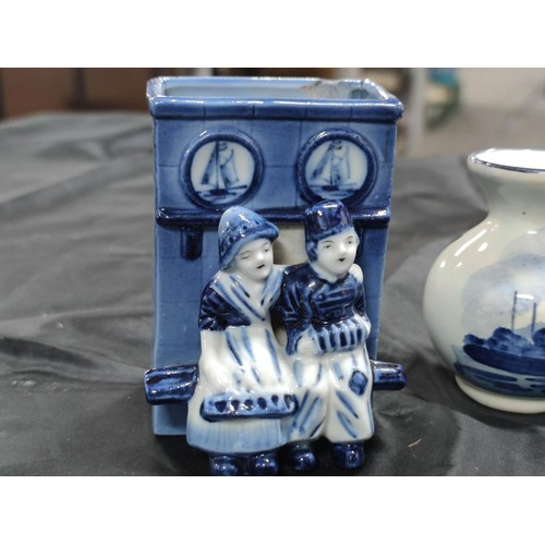 380 - A quantity of Delftware, (2 items marked Delft) includes a ceramic wind up clock.